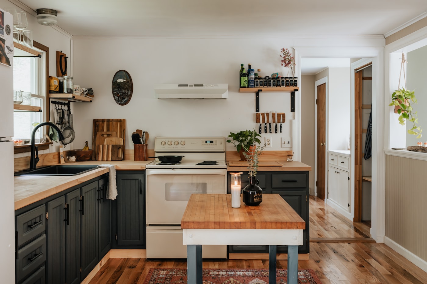 Custom kitchen with white shaker cabinets and farmhouse sink